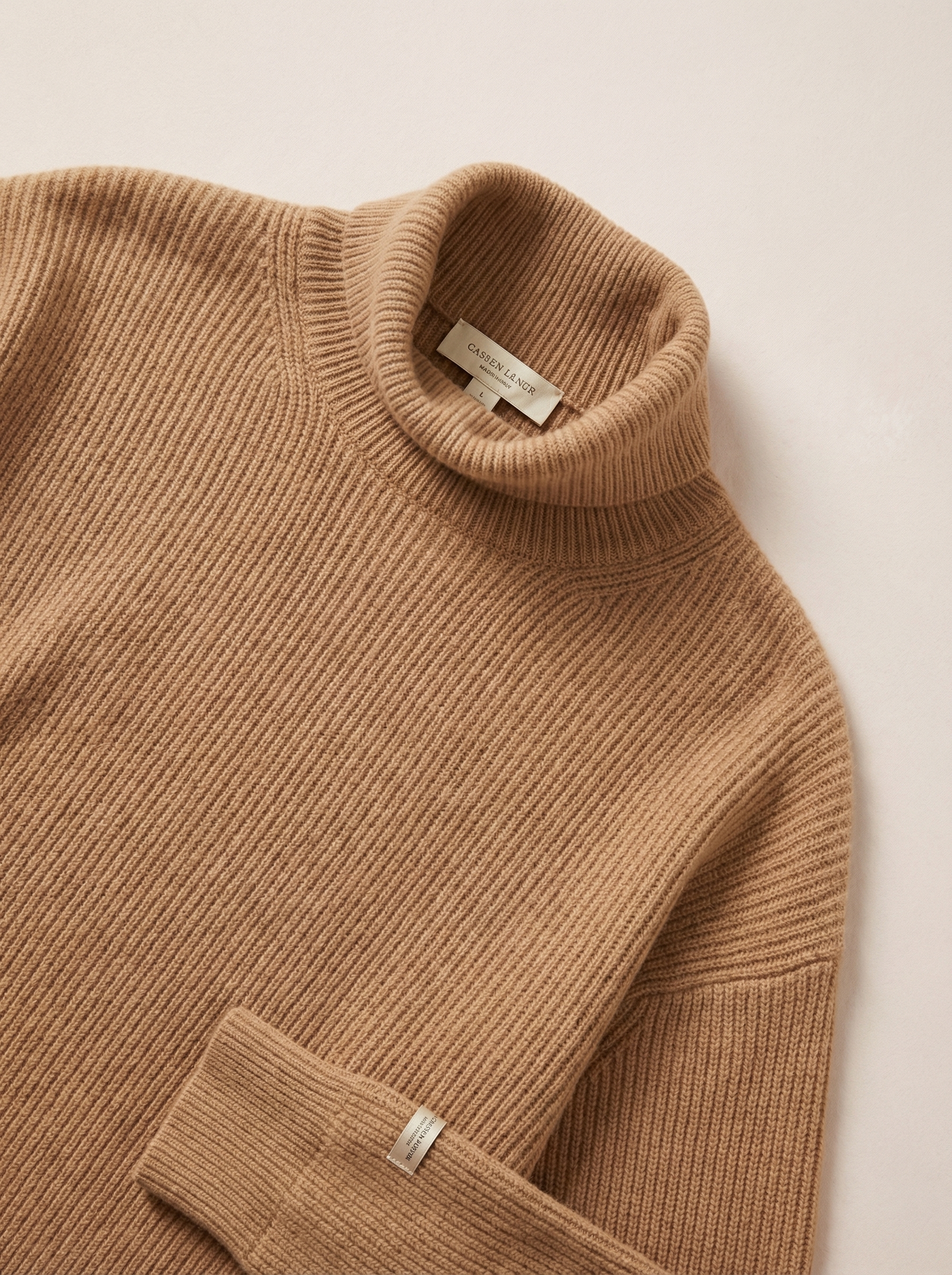 Brand Label flat-lay of camel cashmere ribbed turtleneck